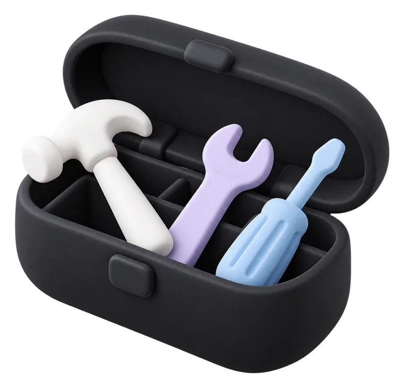 An open toolbox with a hammer, spanner and screwdriver